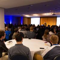 A view of the I am Grand Valley presentation from the back of the Grand River Room.